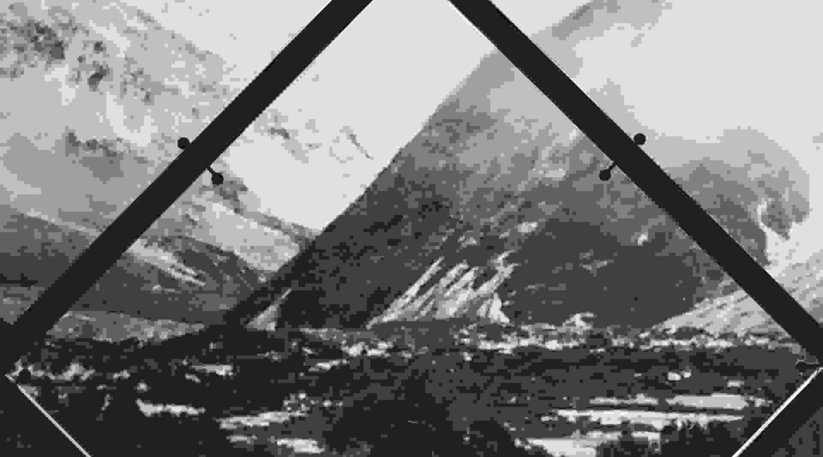 Overlooking mountains through huge glass window